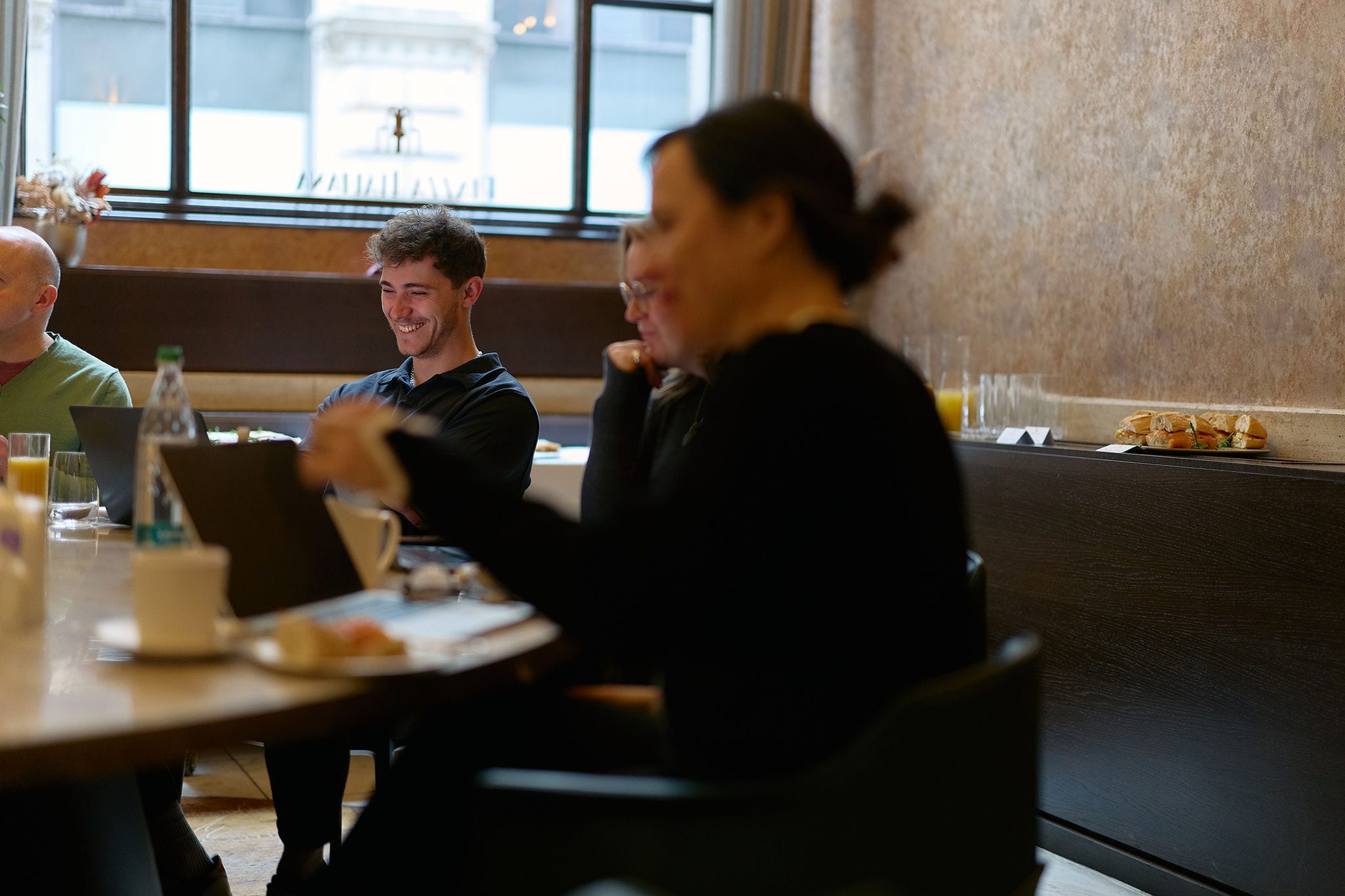 Team collaborating at a roundtable
